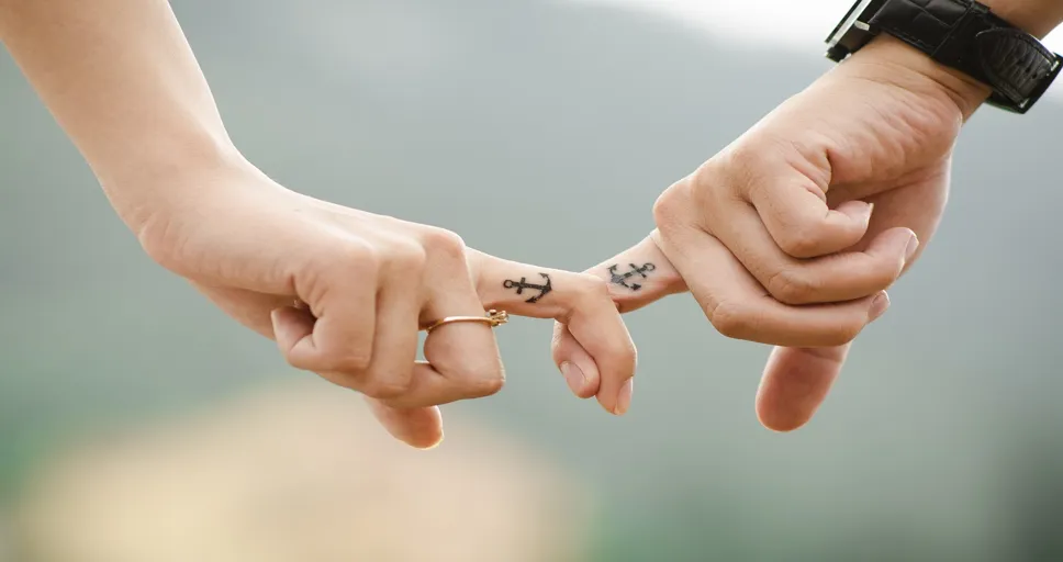 companionship vs relationship - couple, hands, tattoos