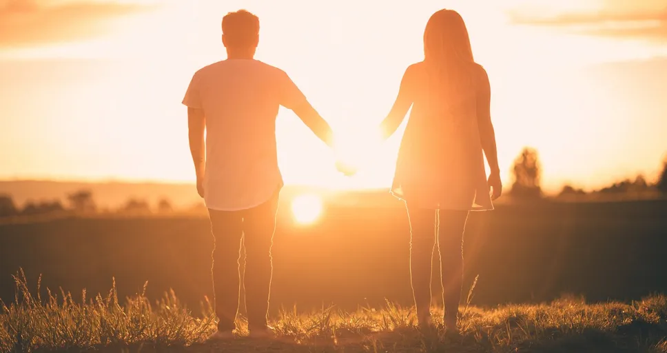 dating someone 10 years younger - people, holding hands, sunset