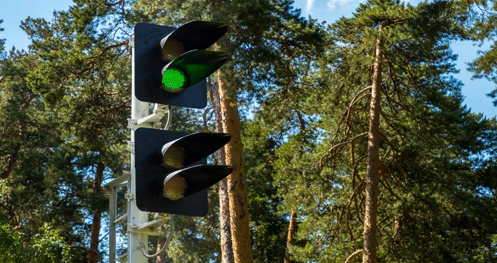 he keeps looking at me from a distance - railway, traffic light, green