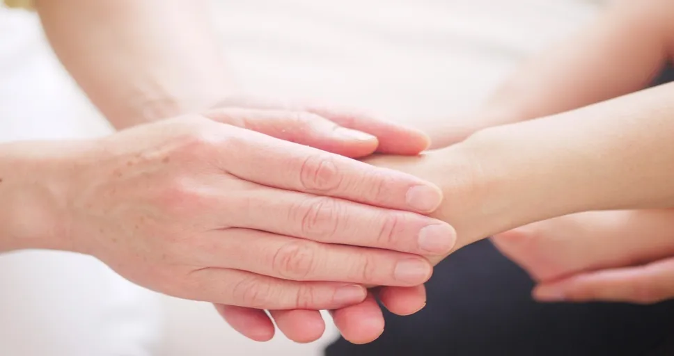 signs of blocked feminine energy - hand, mom, grip