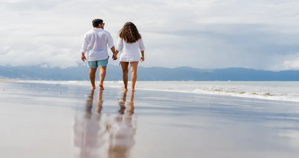 15 signs he cares more than you think - beach, couple, leisure